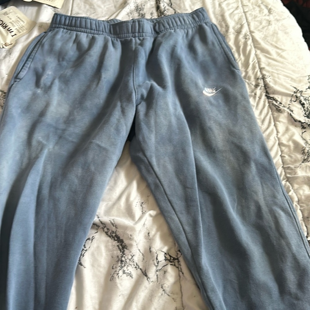 I am selling this amazing blue Nike sweatpants